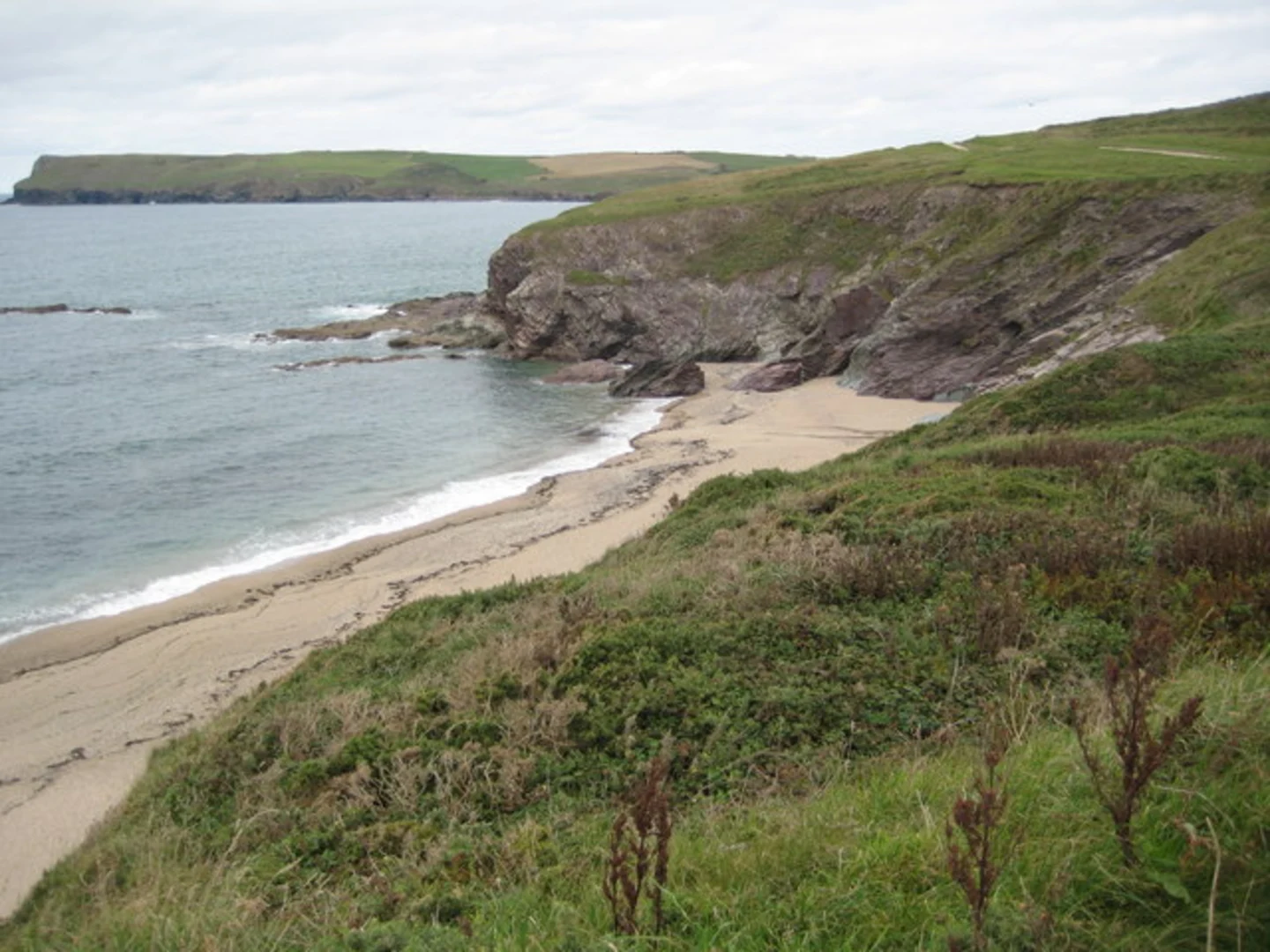 An image depicting the trail Rock Beach to Polzeath Beach Loop and its surrounding area.