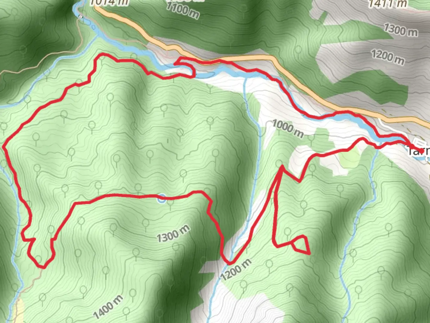 An image depicting the trail Tabayón Waterfall and its surrounding area.