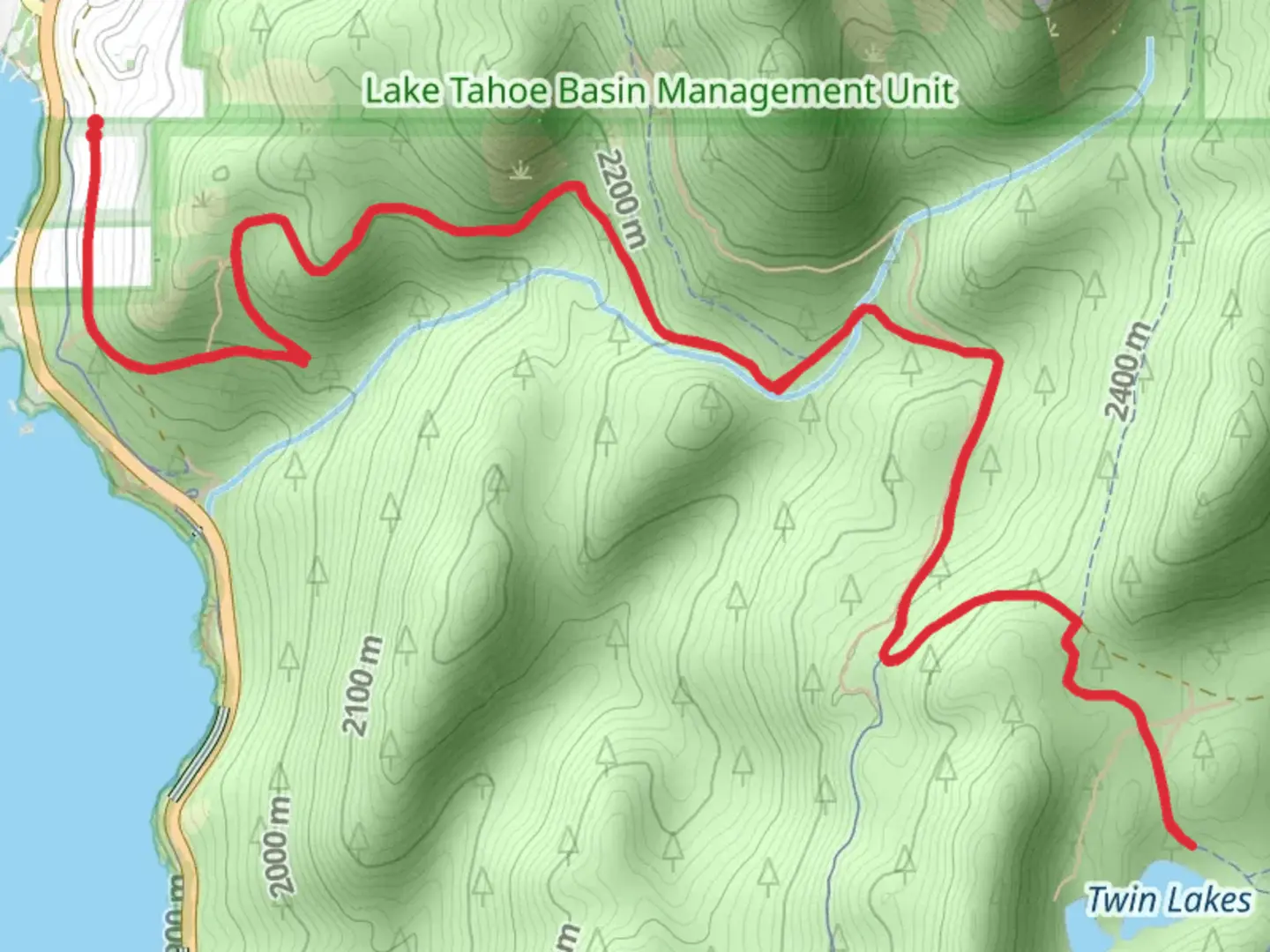 An image depicting the trail Twin Lakes via Tunnel Creek Road and its surrounding area.
