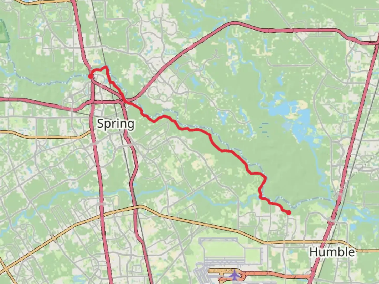 An image depicting the trail Spring Creek Greenway Trail and its surrounding area.