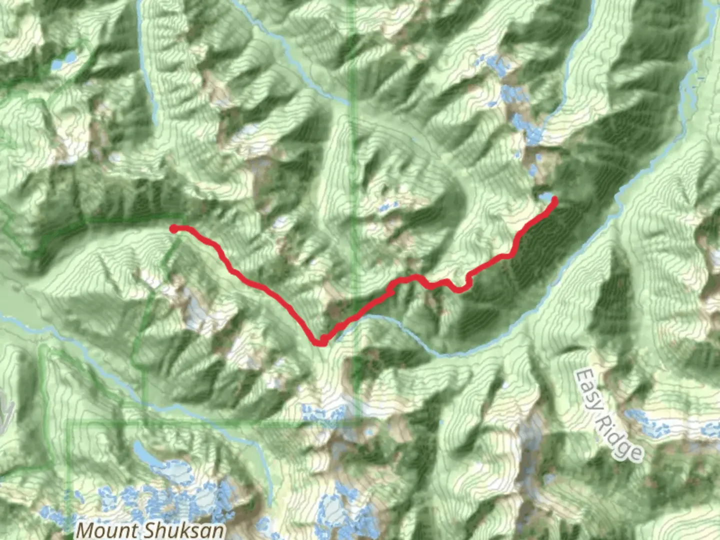 An image depicting the trail Copper Lake via Hannegan Pass Trail and its surrounding area.
