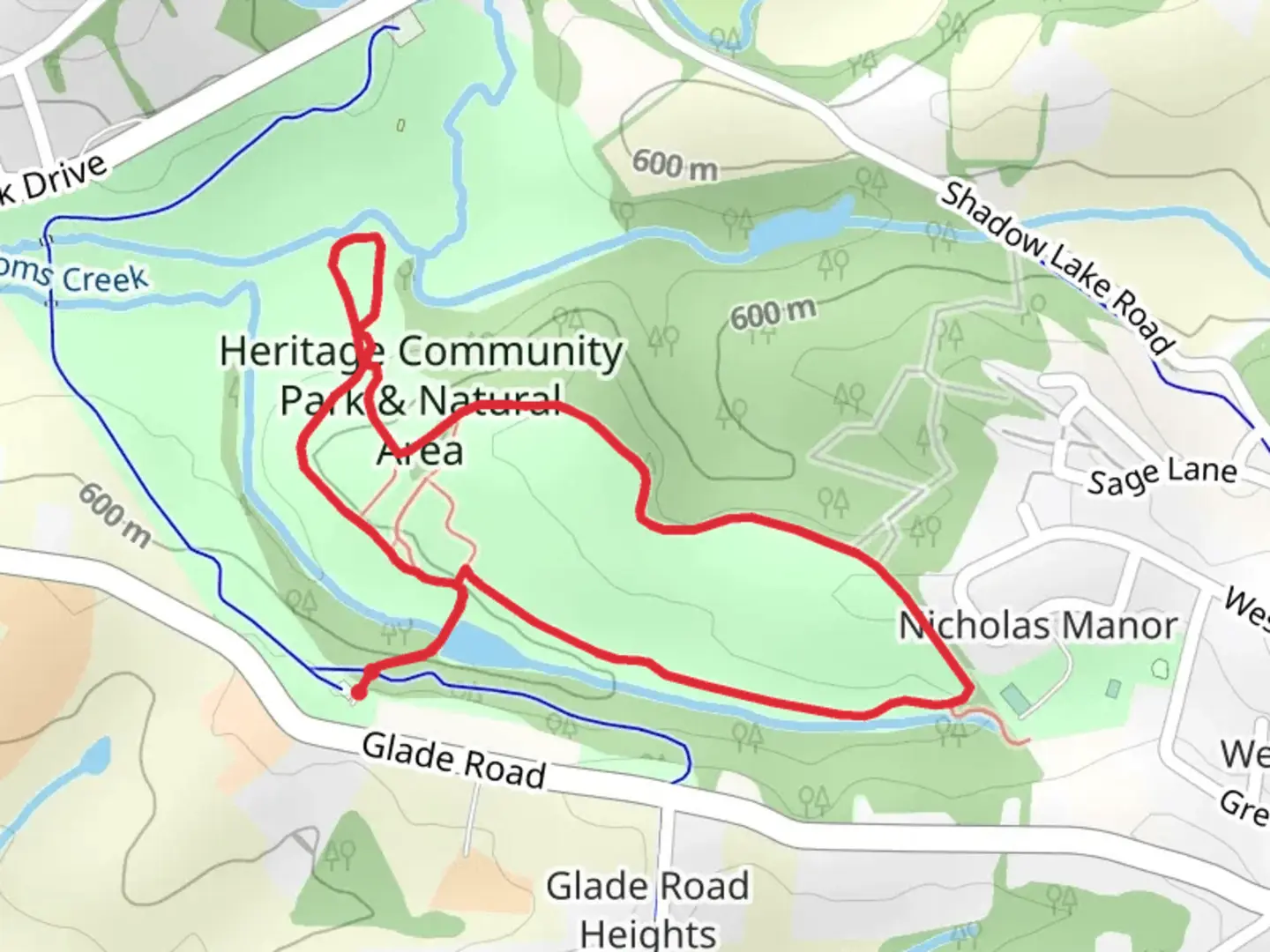 An image depicting the trail Heritage Community Park and Natural Area Loop and its surrounding area.