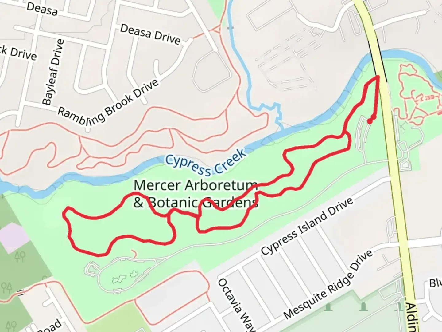 An image depicting the trail Mercer Arboretum and Botanic Gardens Loop and its surrounding area.