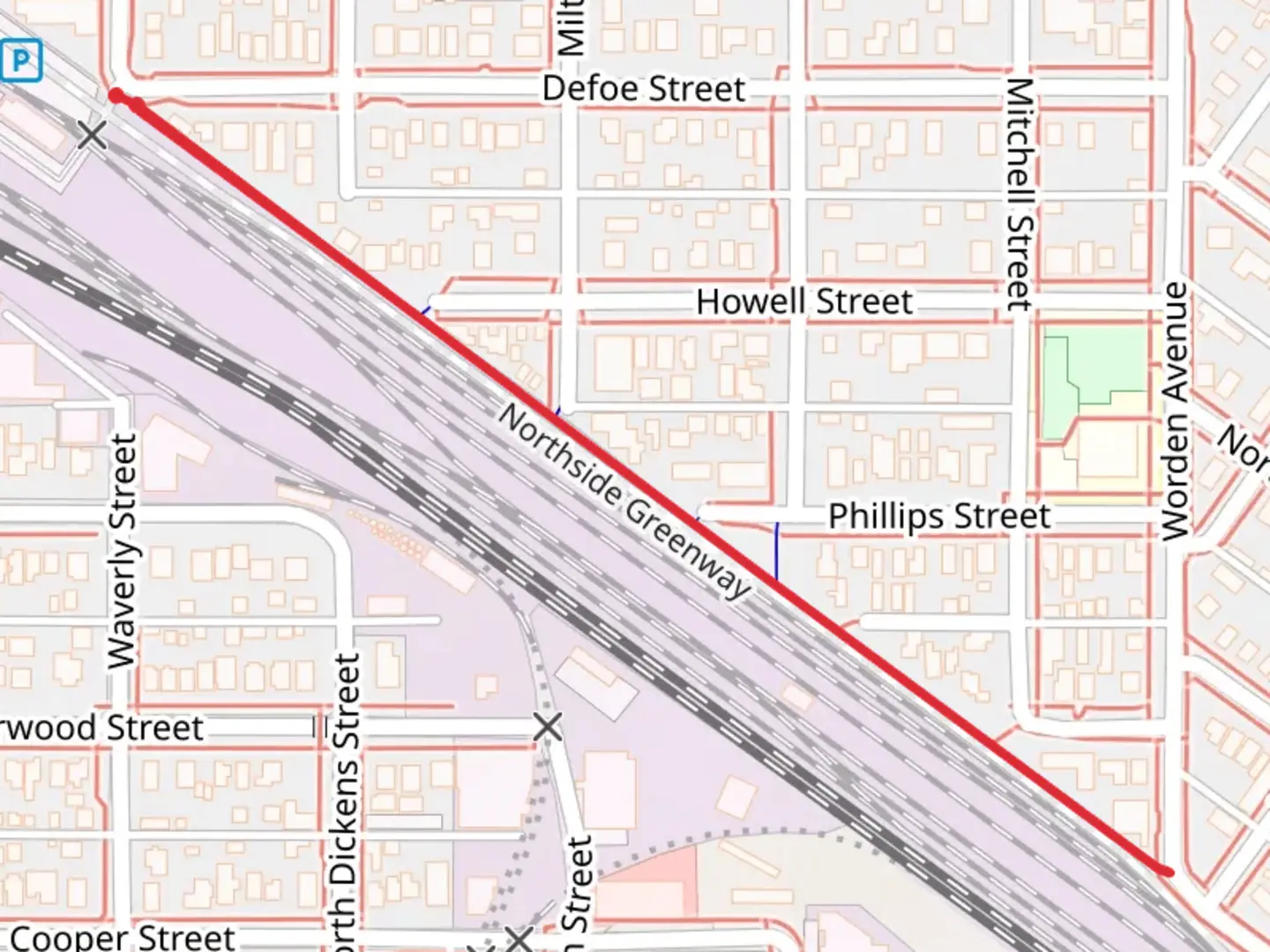 An image depicting the trail Northside Greenway and its surrounding area.