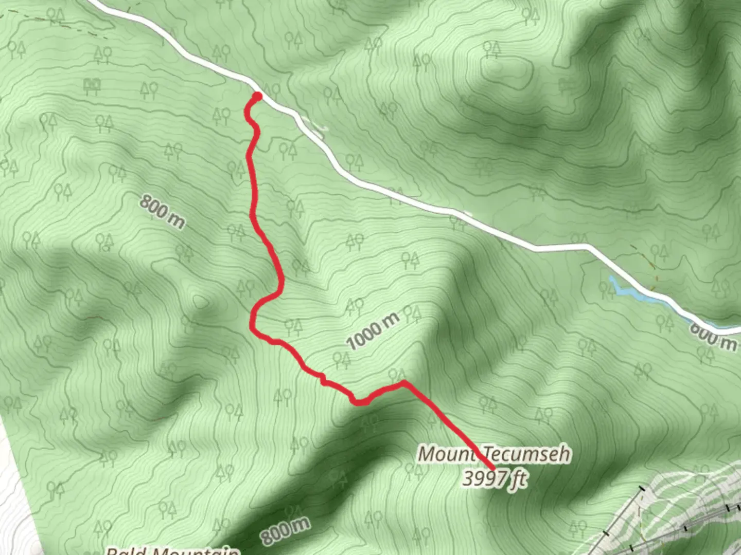 An image depicting the trail Mount Tecumseh Trail from Tripoli Road and its surrounding area.
