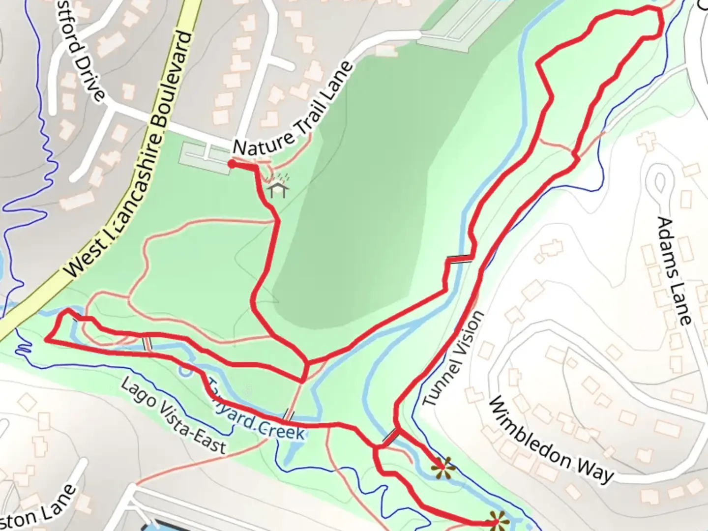 An image depicting the trail Tanyard Creek Park Loop and its surrounding area.