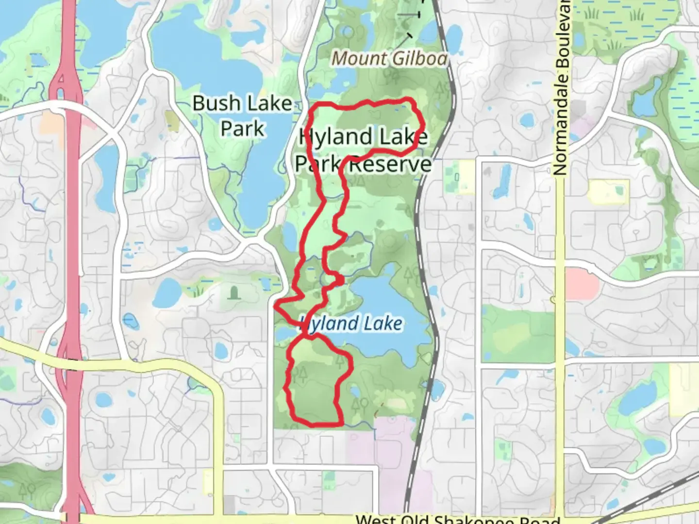 An image depicting the trail Hyland Lake - CP Rail Regional Trail and its surrounding area.