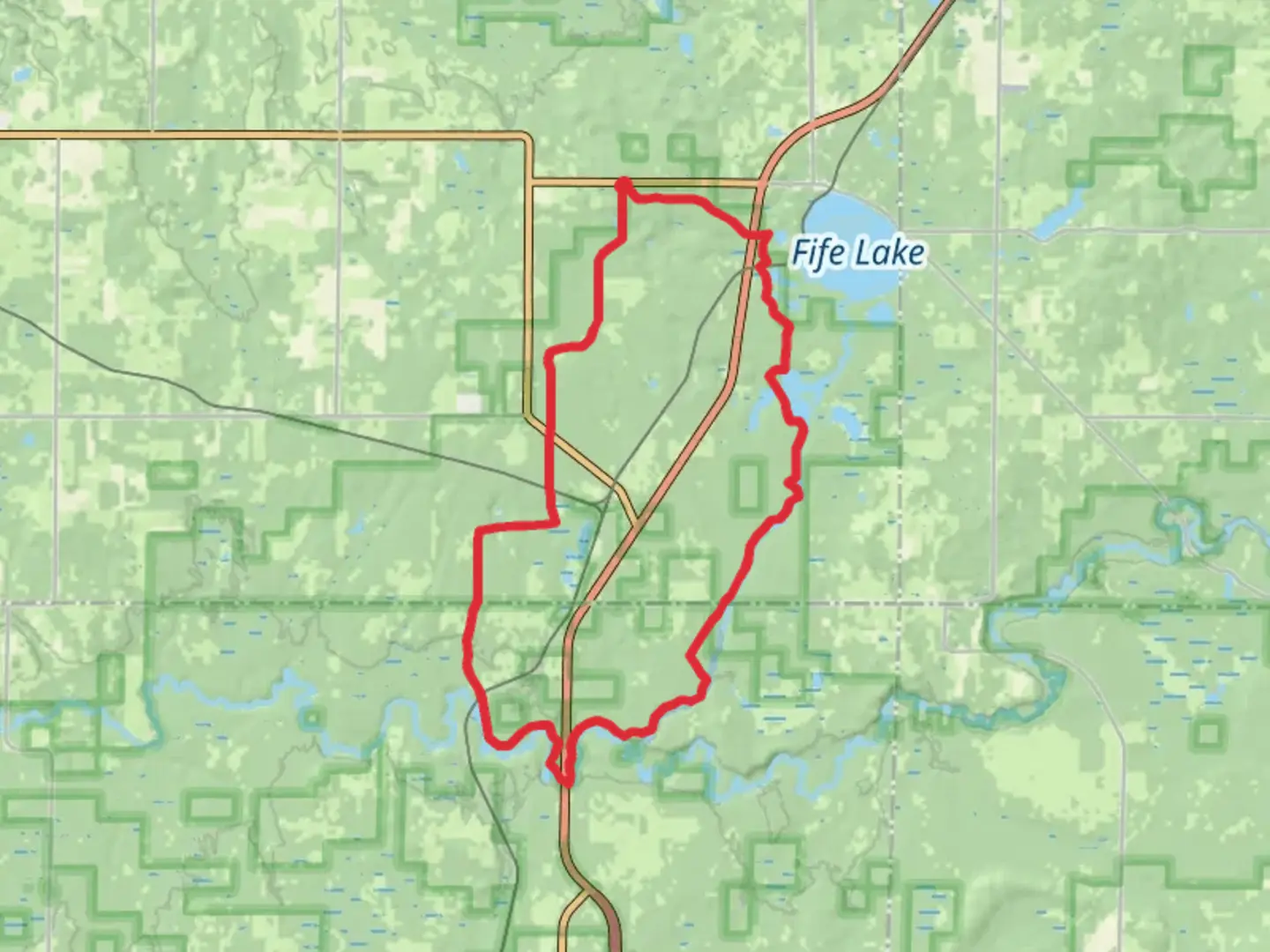 An image depicting the trail Spring Lake State Forest Campground via Fife Lake Trail and its surrounding area.