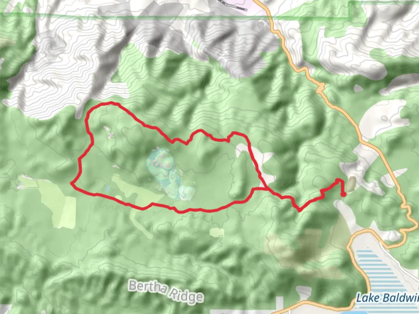 An image depicting the trail Burnt Flat Road and Holcomb Valley Road Loop and its surrounding area.