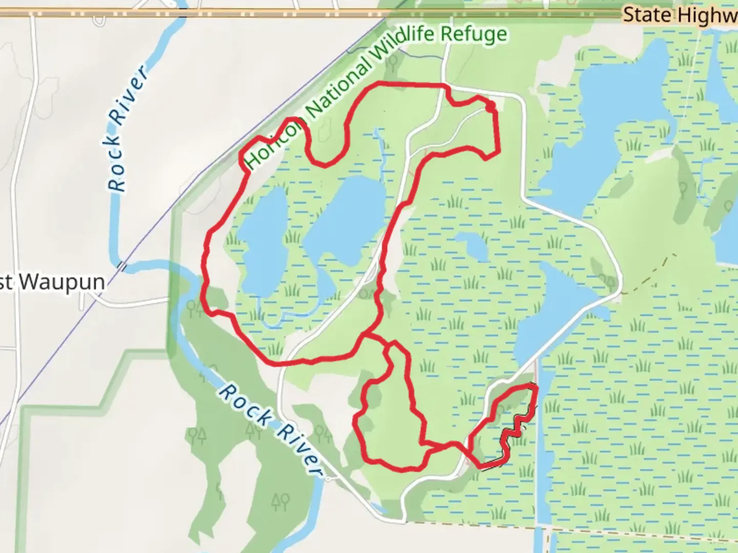 An image depicting the trail Redhead, Red Fox and Egret Hiking Loop Trail and its surrounding area.