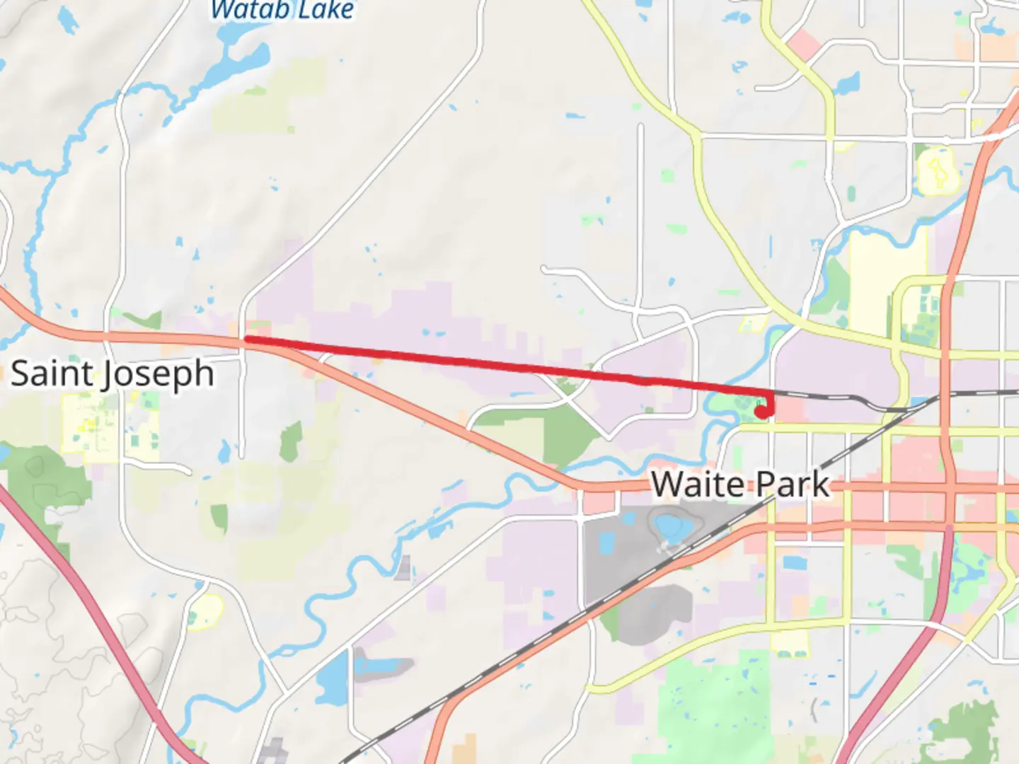 An image depicting the trail Lake Wobegon Regional Trail from Rivers Edge Park and its surrounding area.