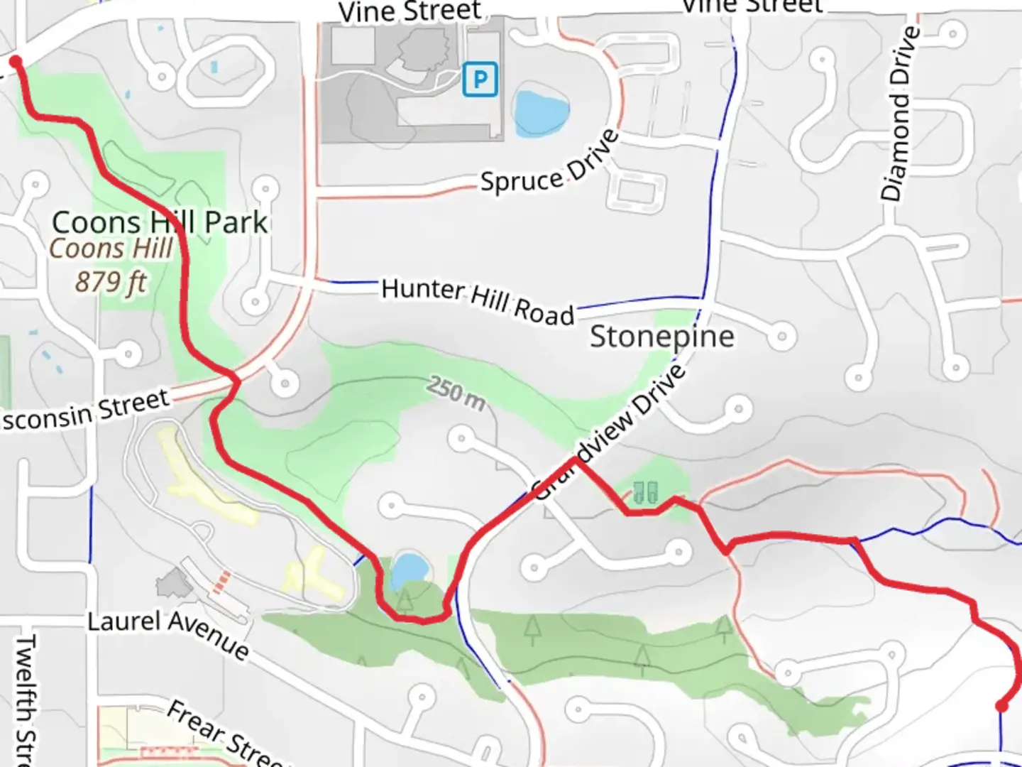 An image depicting the trail Coons Hill Park and its surrounding area.