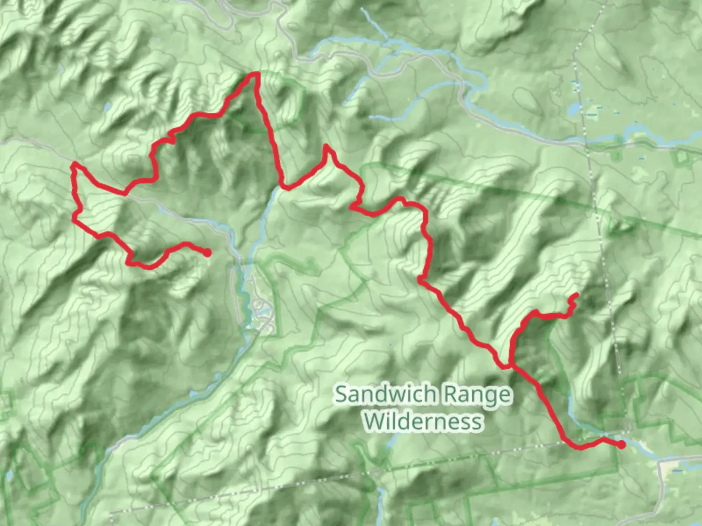 An image depicting the trail Mount Passaconaway to Mount Tecumseh via Blueberry Ledge Trail and its surrounding area.
