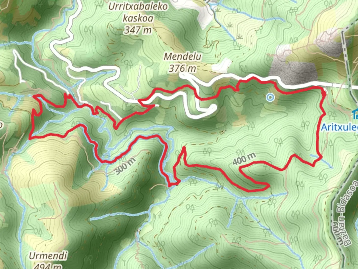 An image depicting the trail Tornola River Source PR GI 1008 and its surrounding area.