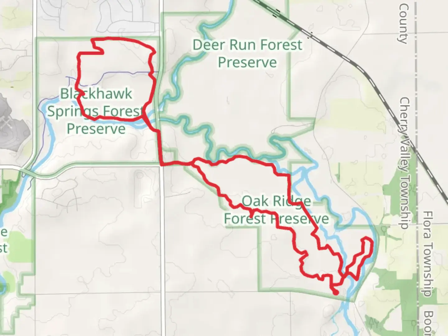 An image depicting the trail Oak Ridge Forest Preserve - Blue -Green - Orange Loop Trail and its surrounding area.