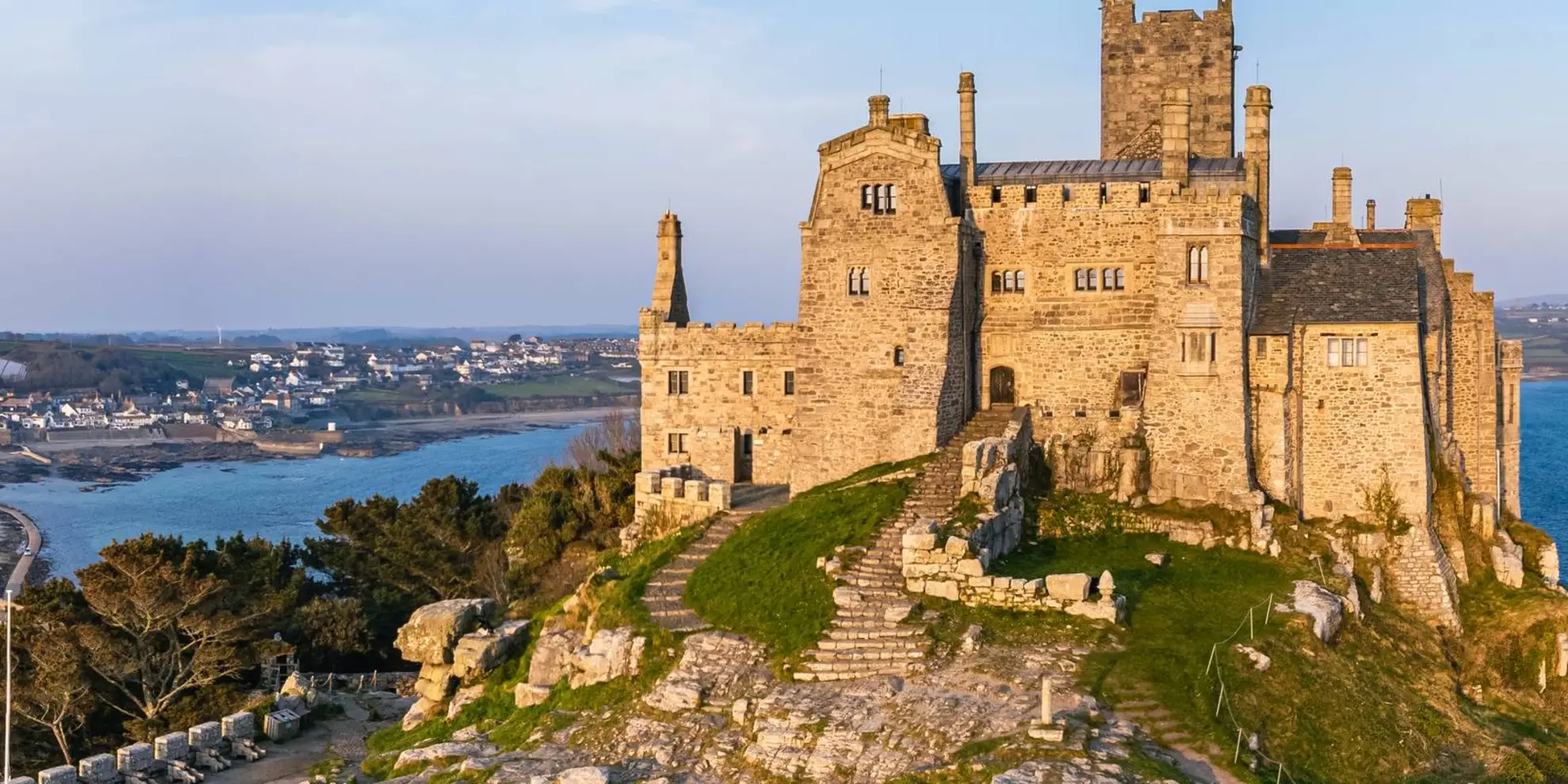 An image depicting the trail Penzance from Marazion Walk and its surrounding area.