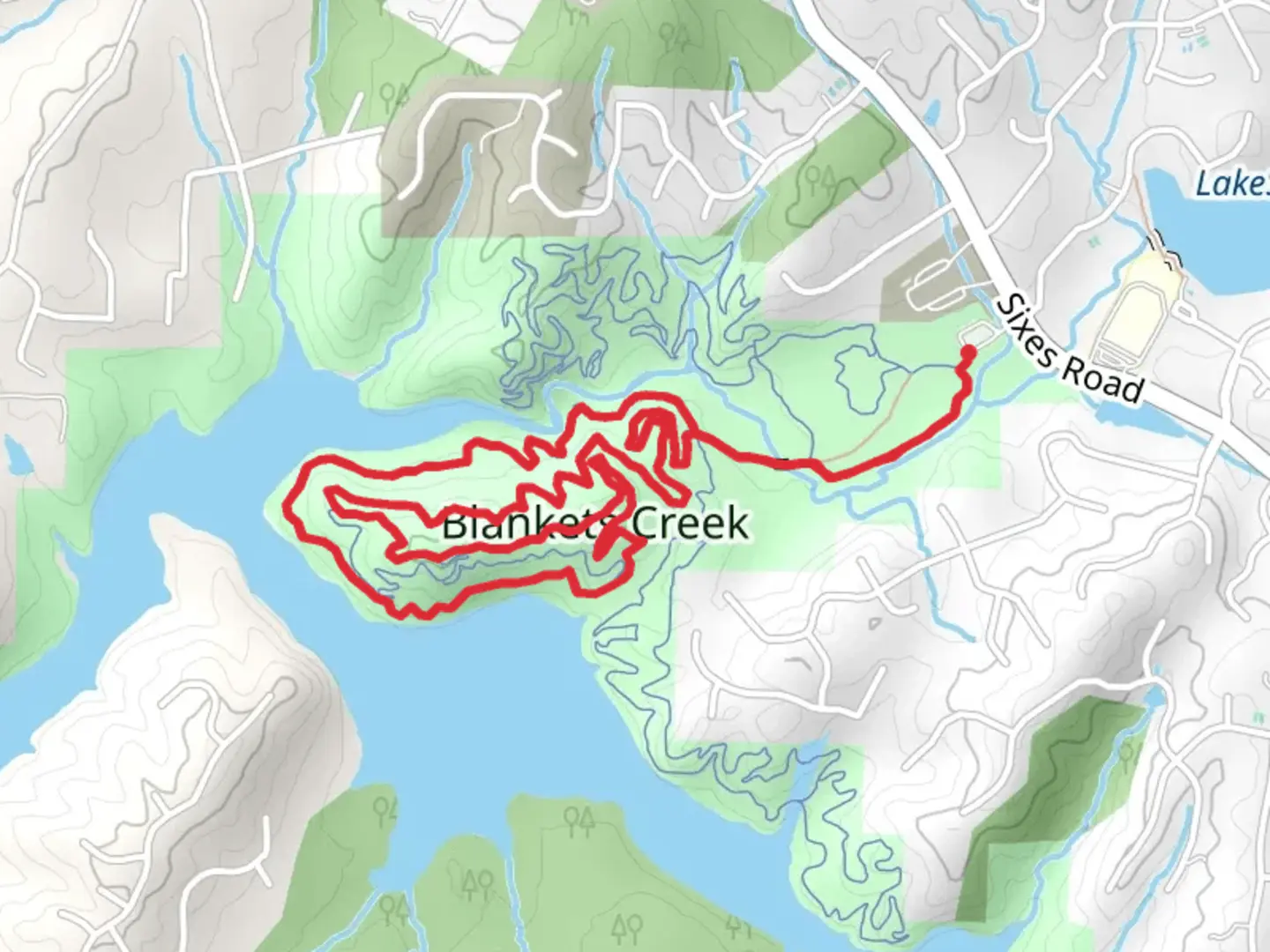 An image depicting the trail Dwelling Loop - Blankets Creek Park and its surrounding area.