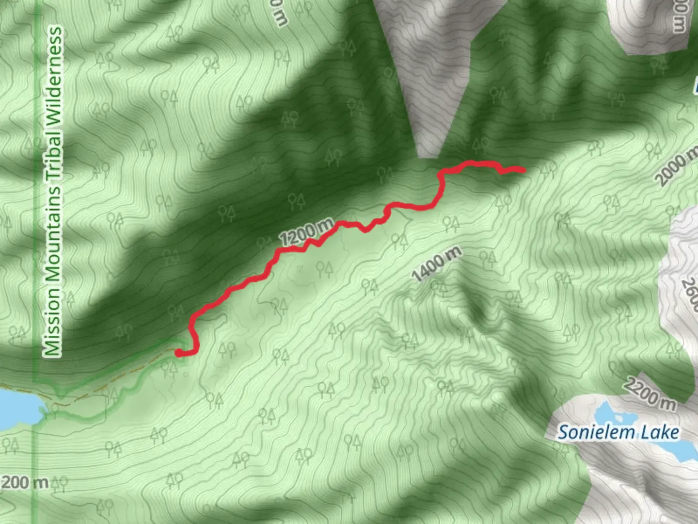 An image depicting the trail Mission Falls via Lucifer Lake Trail and its surrounding area.