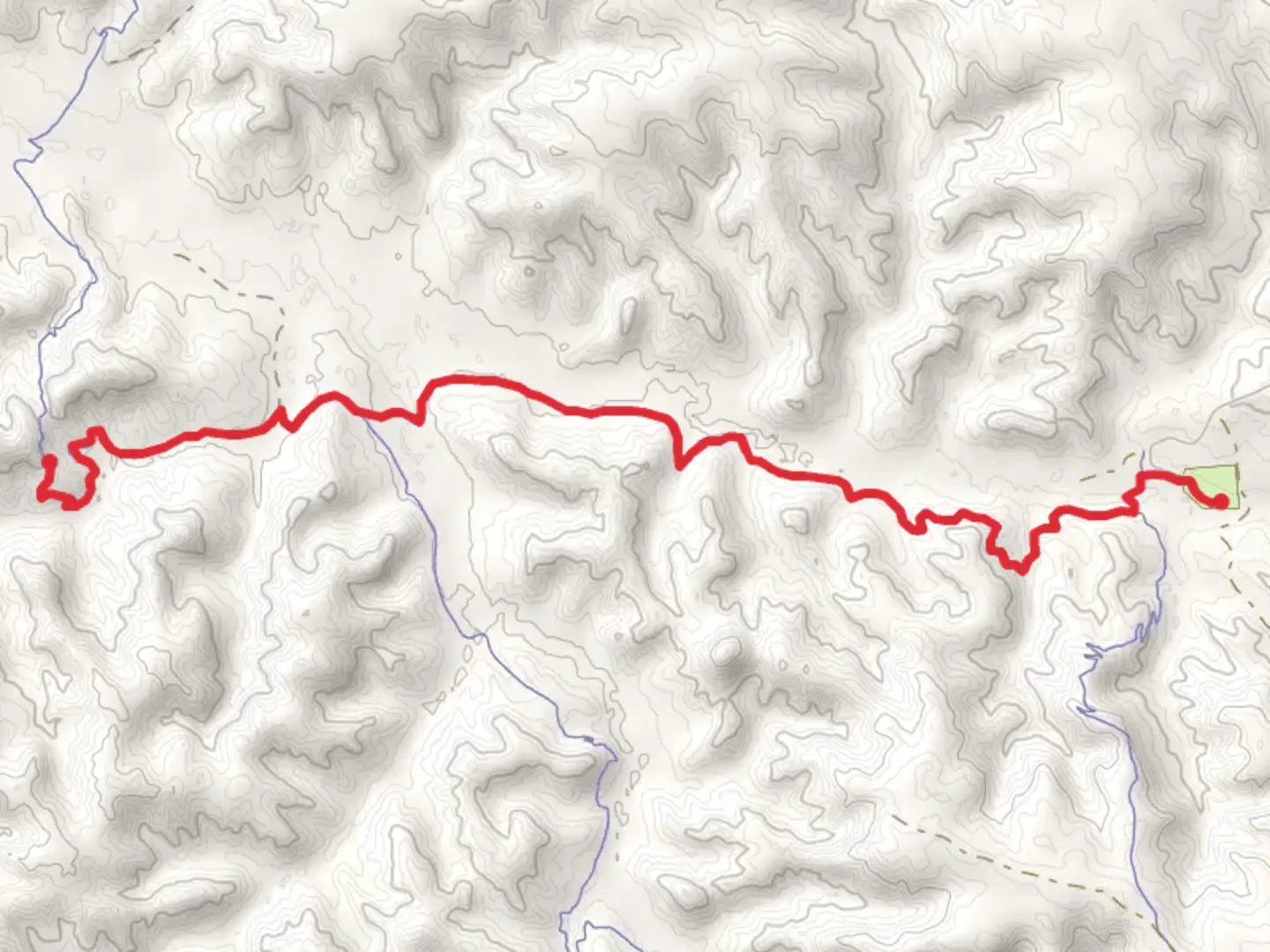 An image depicting the trail Maah Daah Hey Trail from Bennett Campground and its surrounding area.