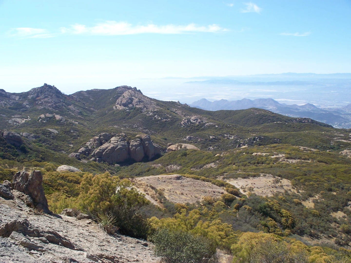 An image depicting the trail Sandstone Peak and its surrounding area.