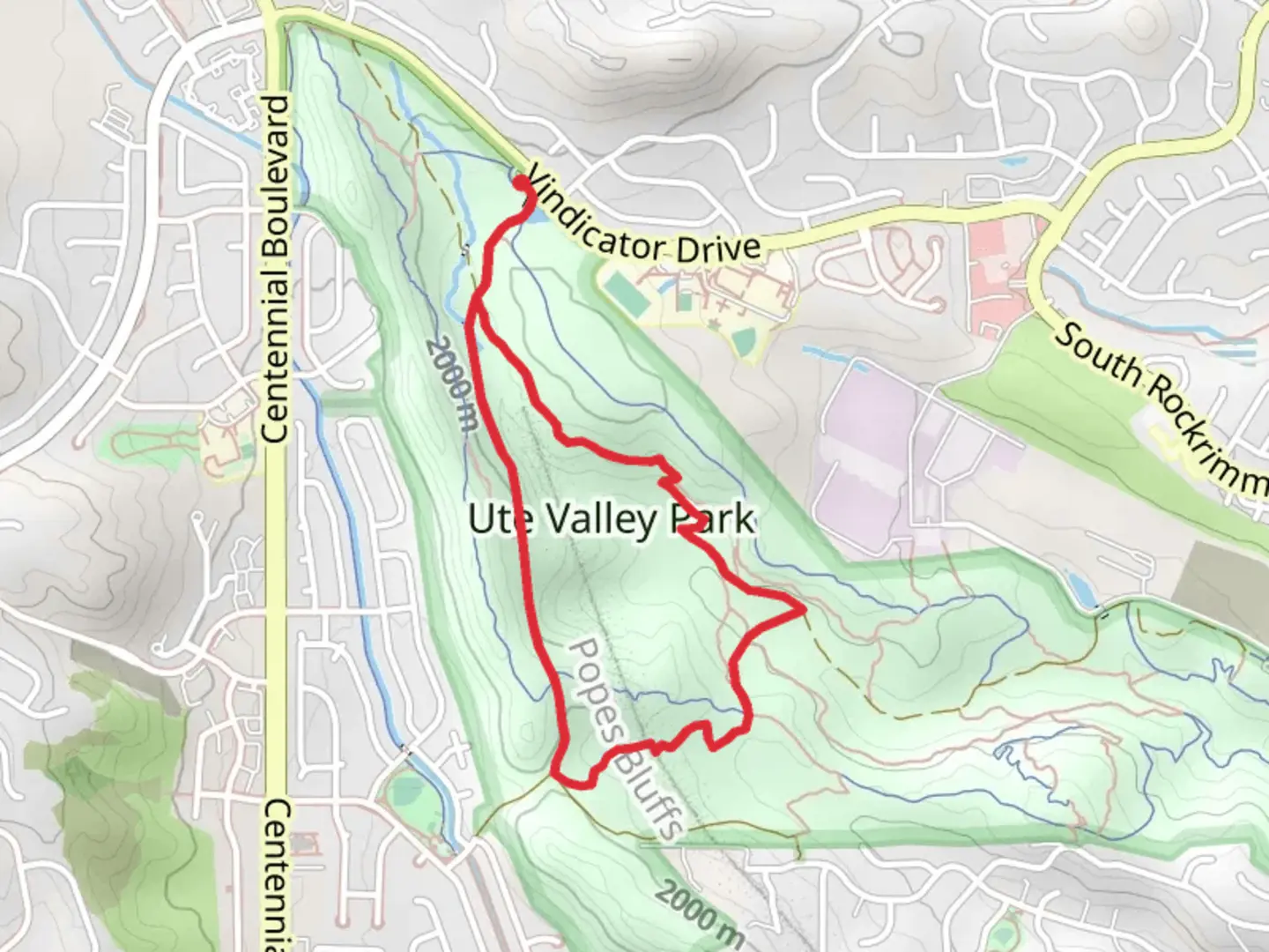 An image depicting the trail Ute Valley Park and Pine Ridge Trail and its surrounding area.