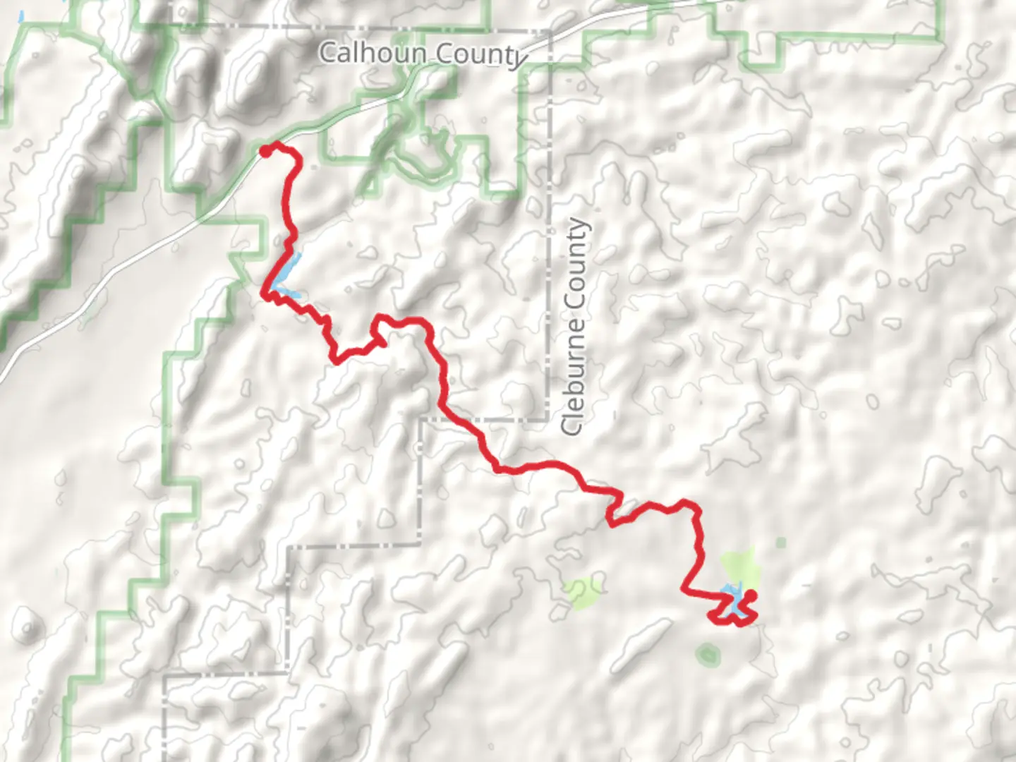 An image depicting the trail Coleman Lake via Pinhoti Trail and its surrounding area.