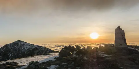 An image depicting the trail Snowdon and Garnedd Ugain from Llanberis and its surrounding area.