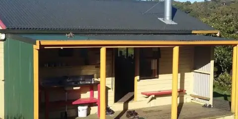 An image depicting the trail Te Rereatukahia Hut Track and its surrounding area.