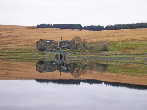 An image depicting the trail Hebden Bridge to Withens Clough Reservoir Loop via Stoodley Pike and its surrounding area.