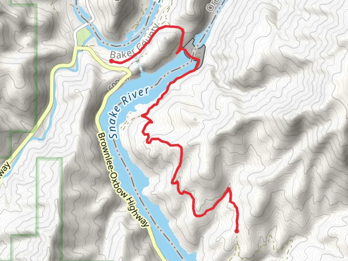 An image depicting the trail Spillway Road - Snake River and its surrounding area.