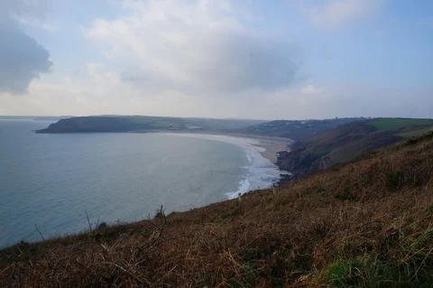 An image depicting the trail Freshwater East - Dunes and its surrounding area.