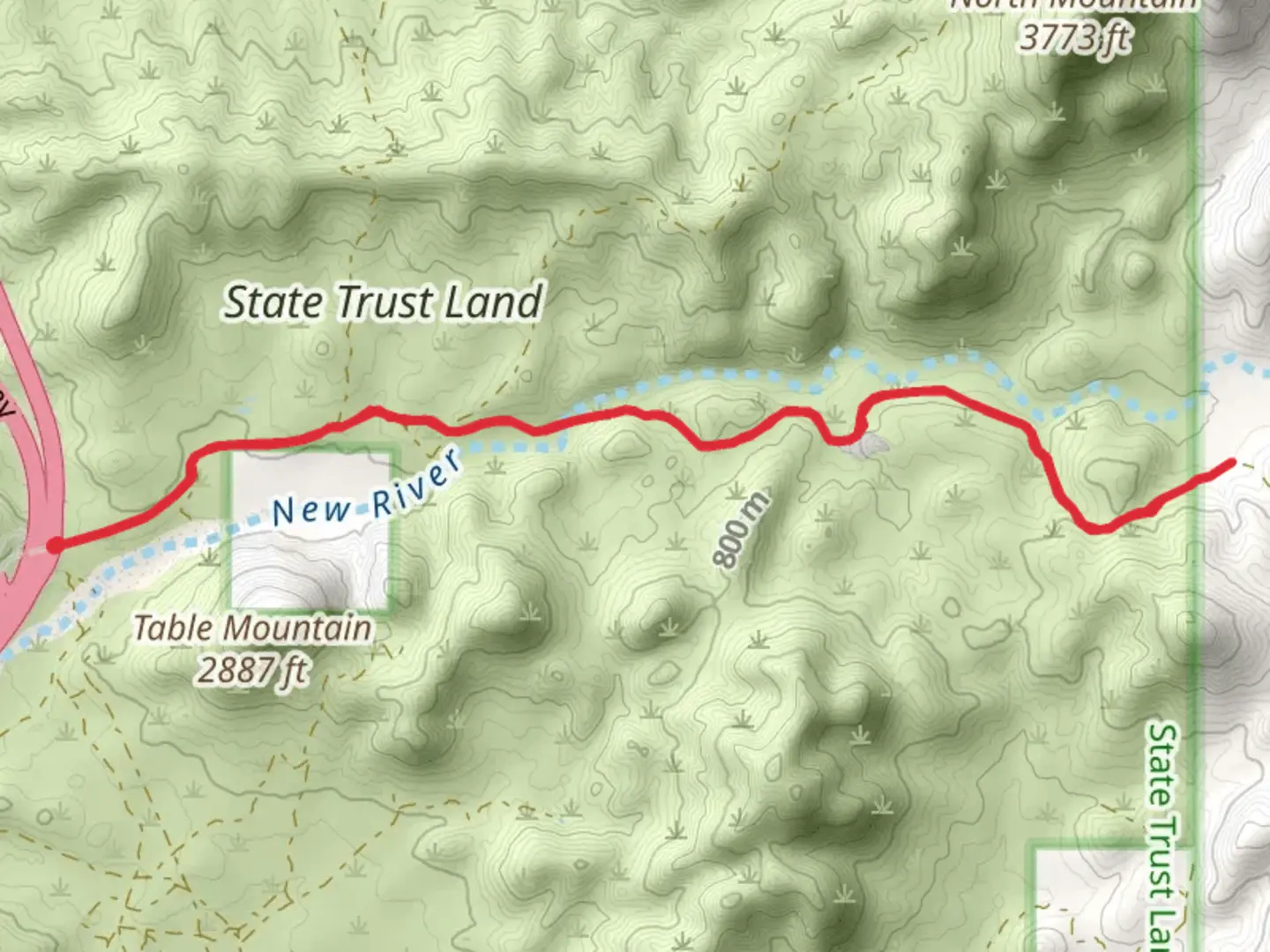An image depicting the trail West Table Mesa Road and its surrounding area.