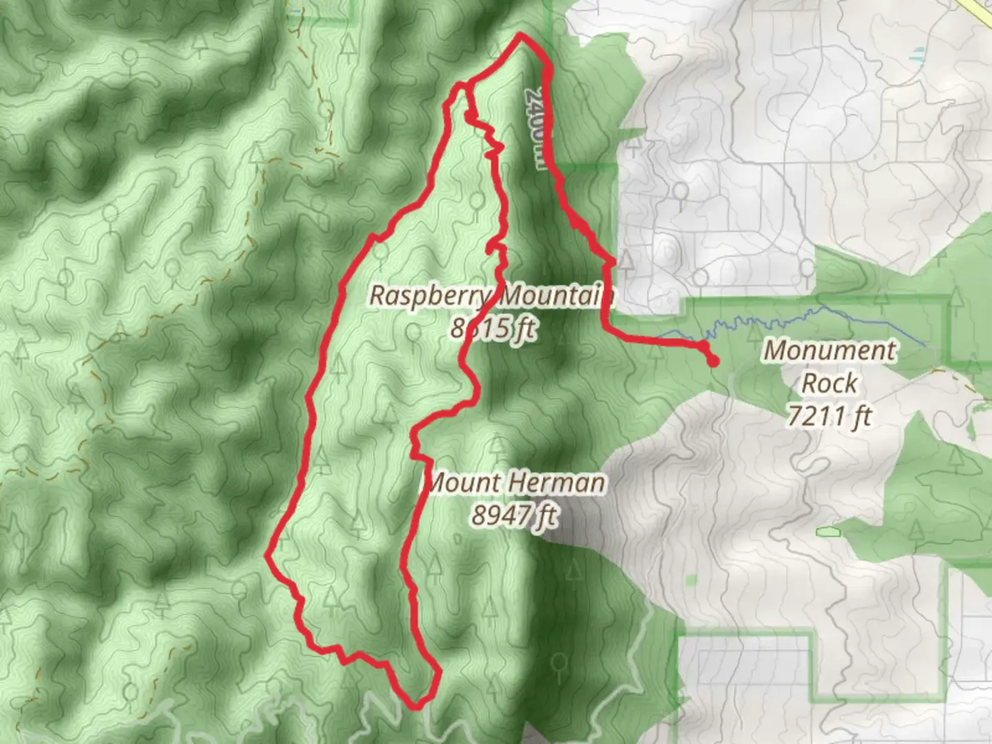 An image depicting the trail White Ghost, monument Trail and Raspberry Mountain Loop and its surrounding area.