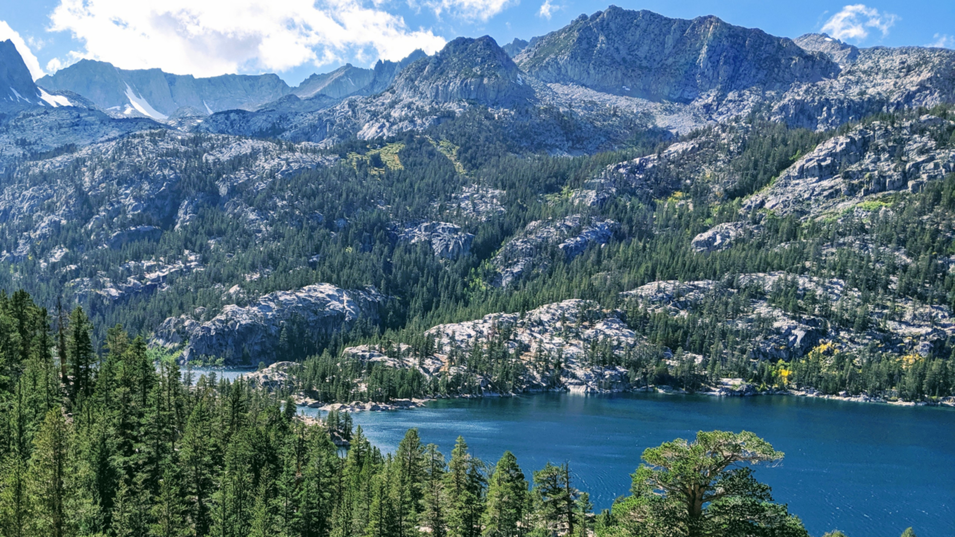 An image depicting the trail Mary Louise Lake via Bishop Pass Trail and its surrounding area.