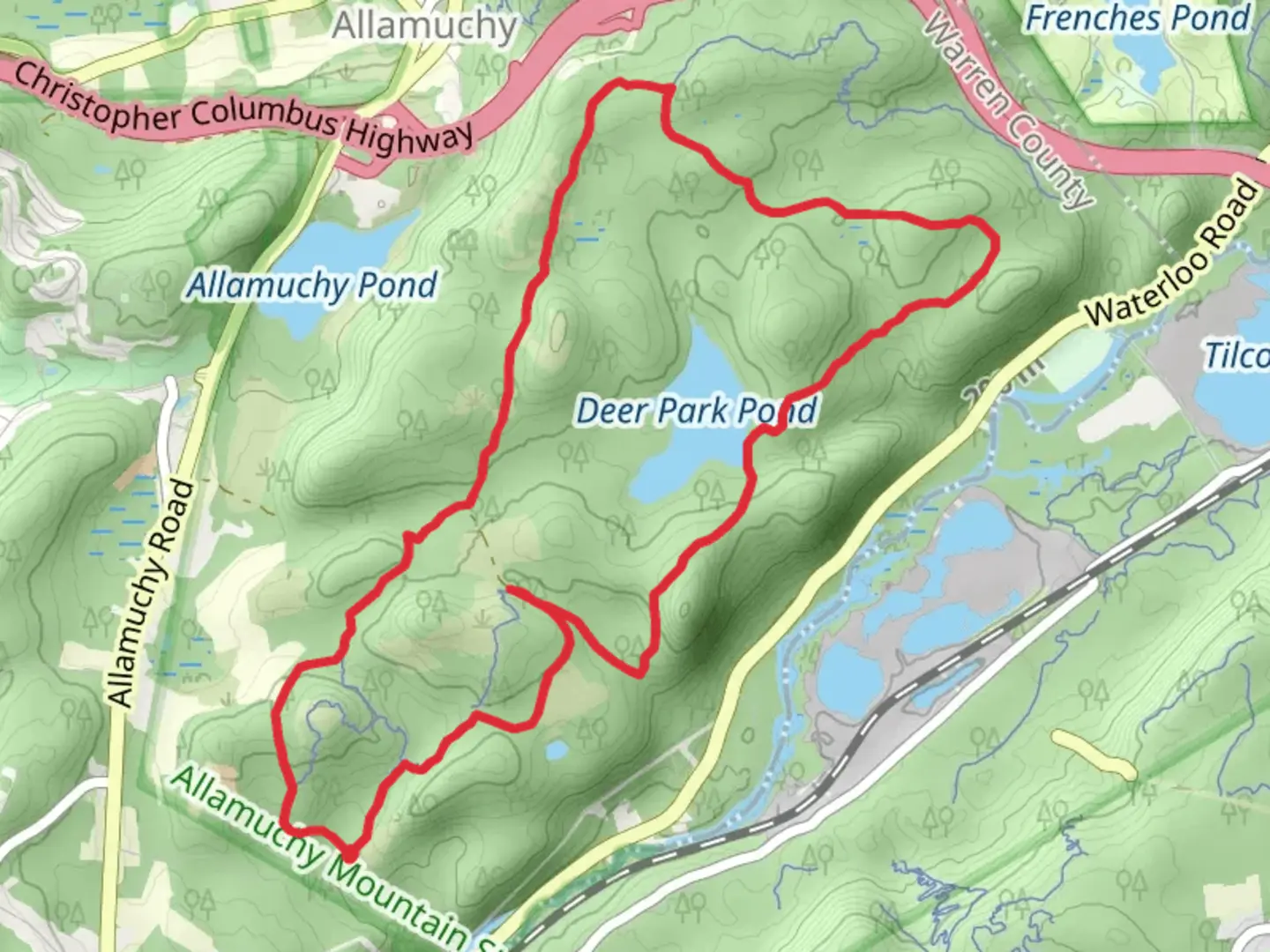 An image depicting the trail Unblazed Trail and White Trail - Deer Path Loop and its surrounding area.