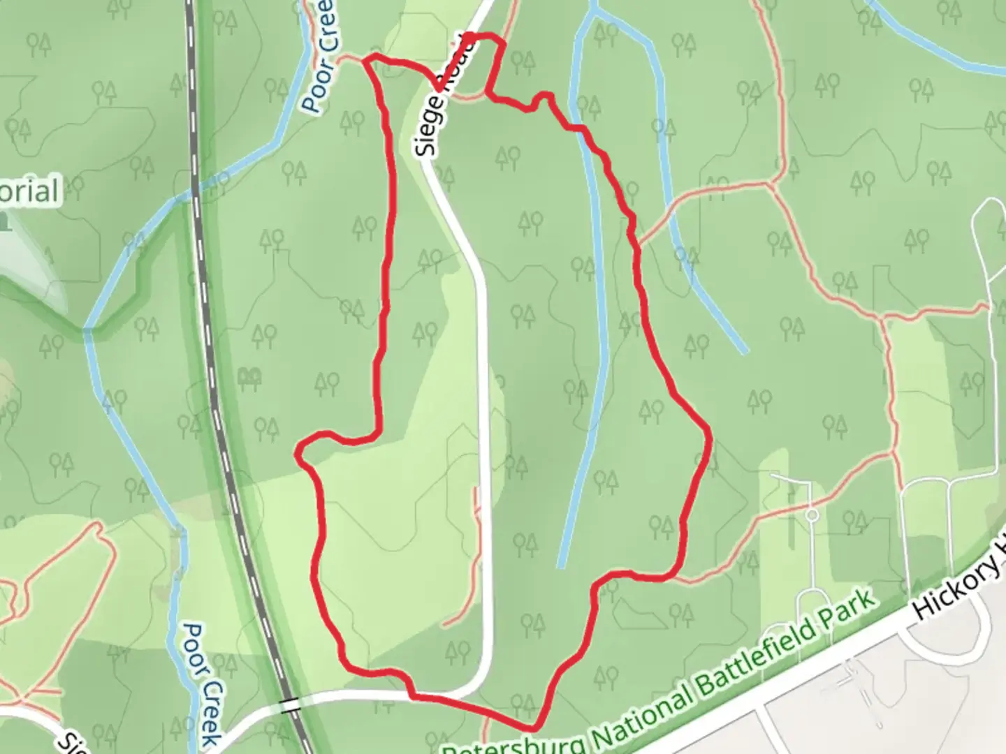 An image depicting the trail Siege Road via Poor Creek Loop and its surrounding area.