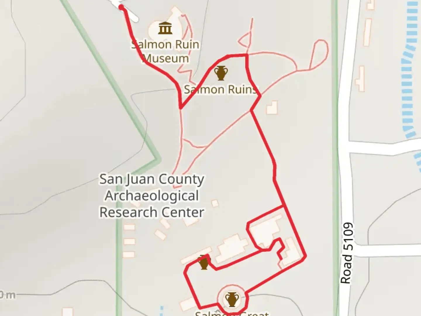 An image depicting the trail US 64 Frontage Road and its surrounding area.