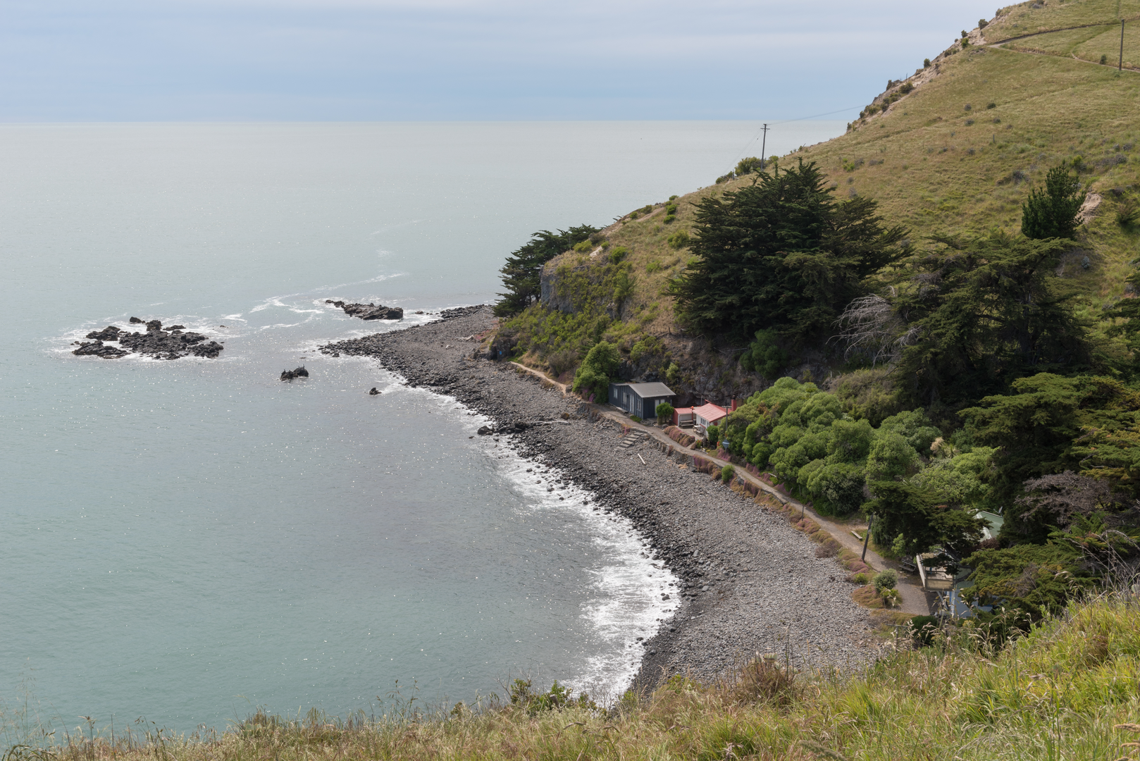 An image depicting the trail Awaroa - Godley Head Loop Track and its surrounding area.