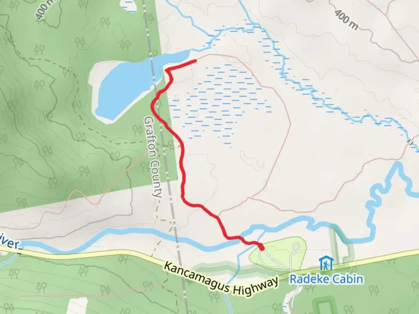 An image depicting the trail From Swift River to Church Pond Trail and its surrounding area.