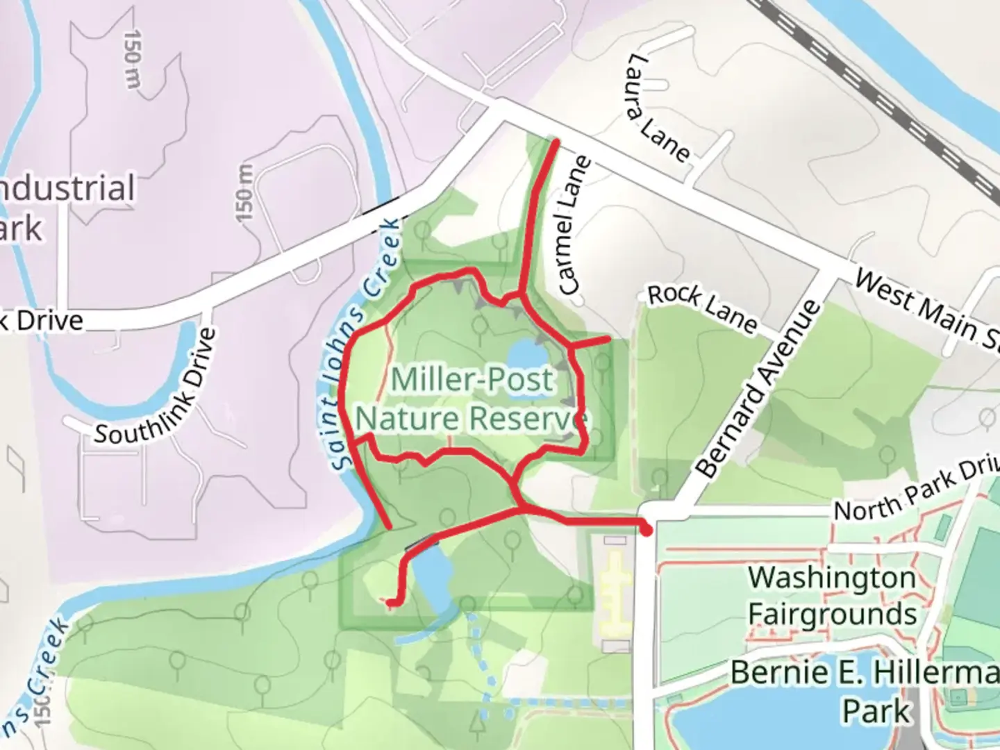 An image depicting the trail Loop beside Saint Johns Creek and its surrounding area.