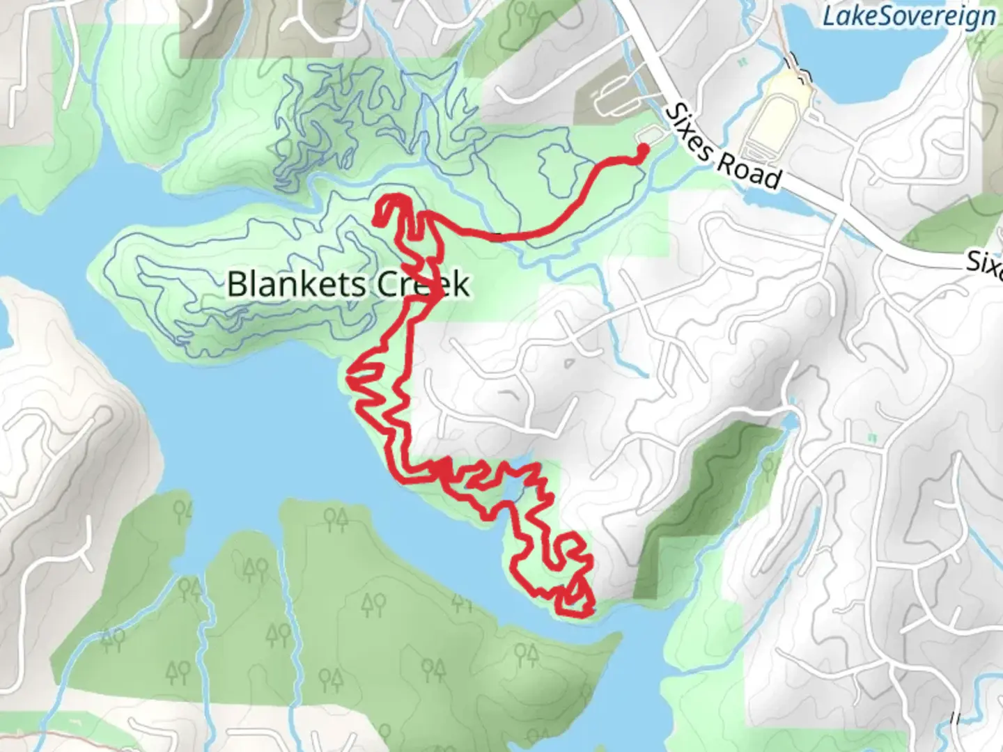 An image depicting the trail South Loop - Blankets Creek Park and its surrounding area.