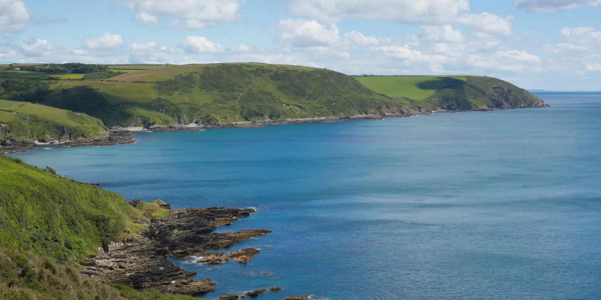 An image depicting the trail Lansallos Coastal and Woodland Walk and its surrounding area.