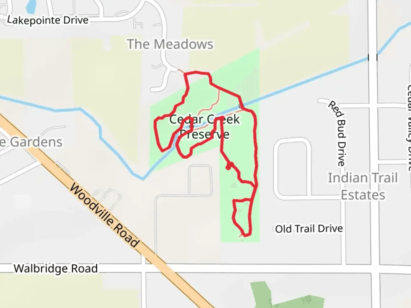 An image depicting the trail Cedar Creek Preserve Loop and its surrounding area.