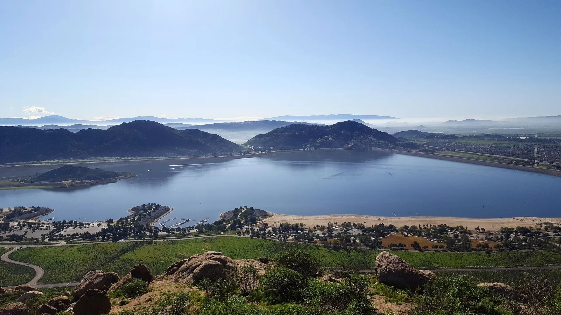 An image depicting the trail Lake Perris Loop and its surrounding area.