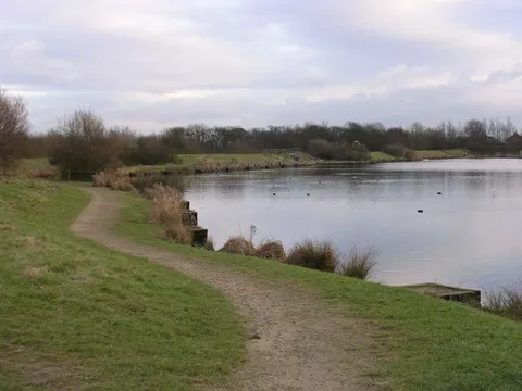 An image depicting the trail Blackleach Reservoir via Linnyshaw Loopline and its surrounding area.