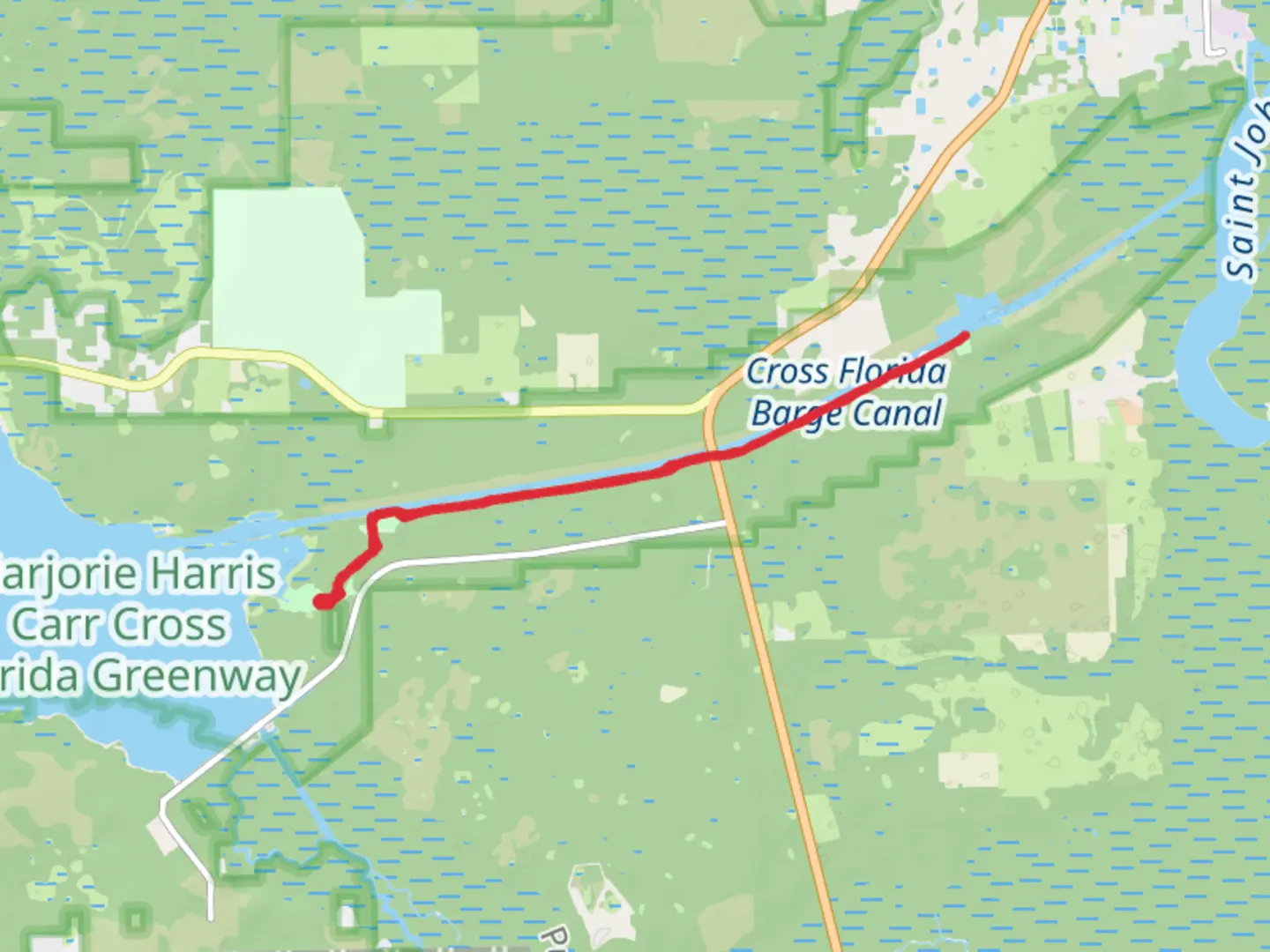 An image depicting the trail Walk along Cross-Florida Barge Canal - Rodman Dam Road and its surrounding area.