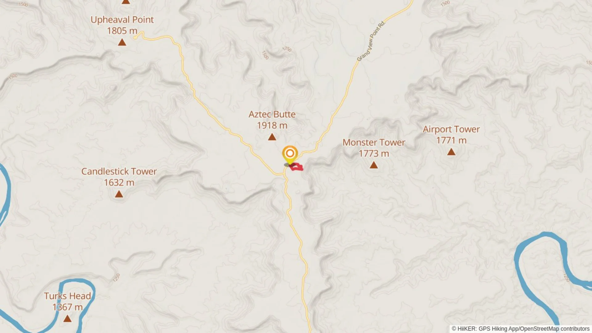 An image depicting the trail Mesa Arch Loop and its surrounding area.