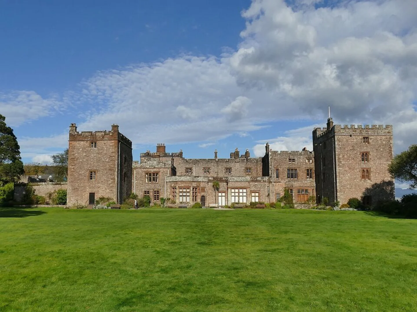 An image depicting the trail Muncaster Castle Loop and its surrounding area.