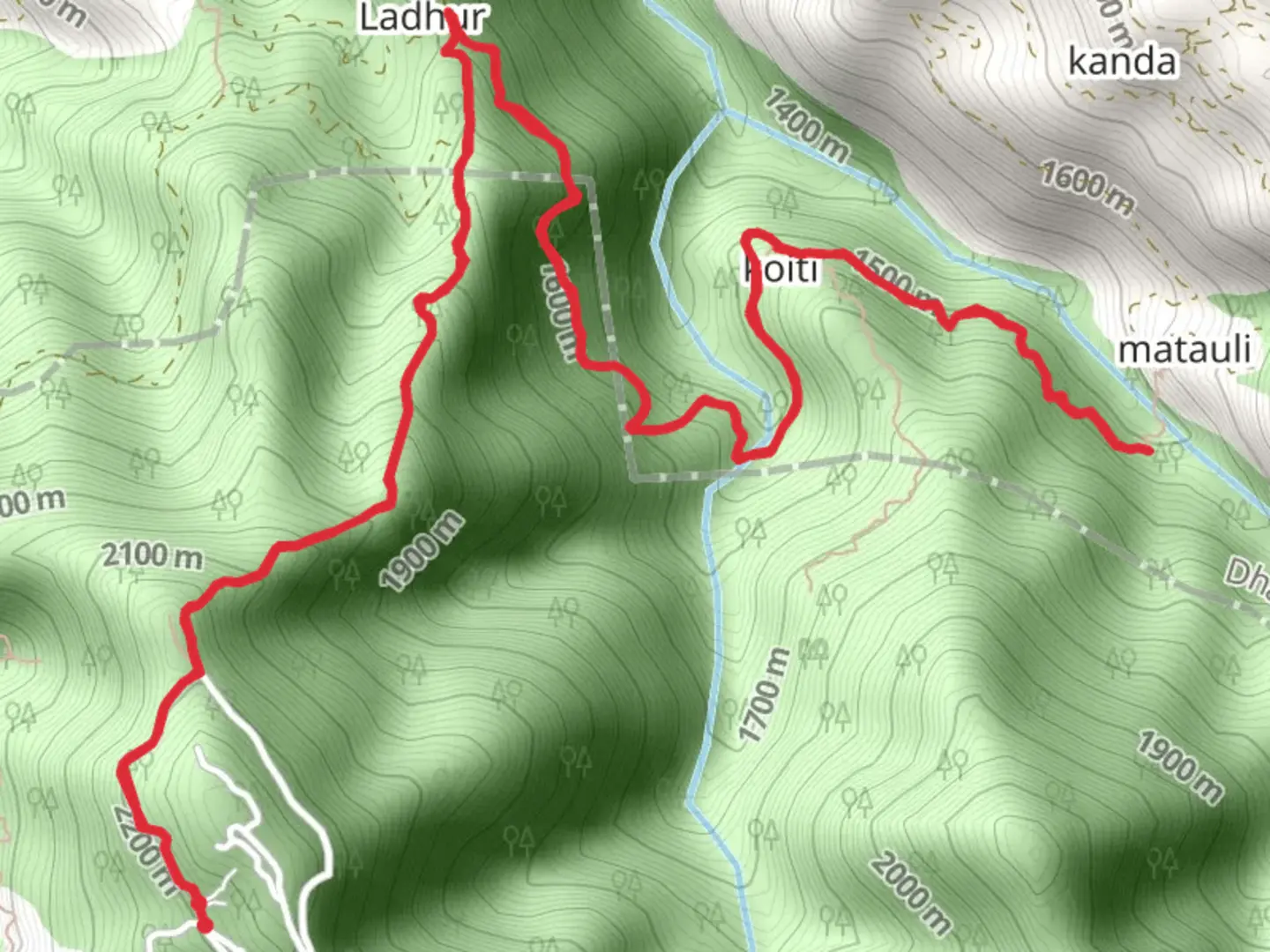 An image depicting the trail Lal Tibba Trek and its surrounding area.