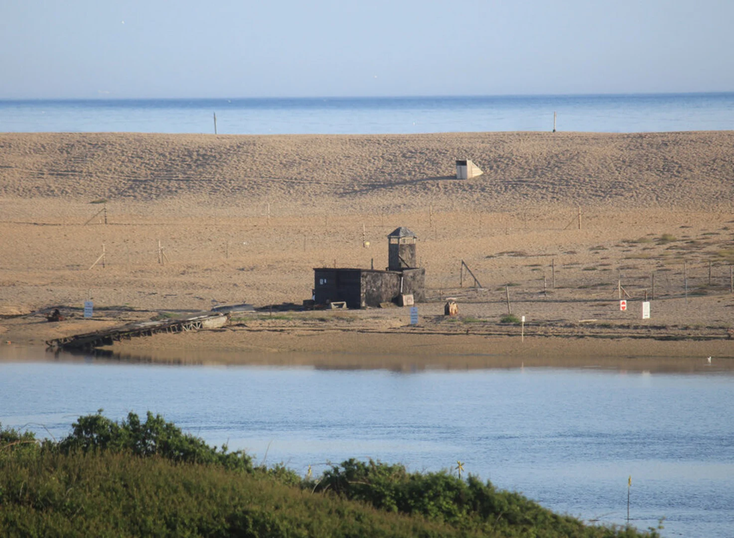 An image depicting the trail Chesil Beach Walk and its surrounding area.